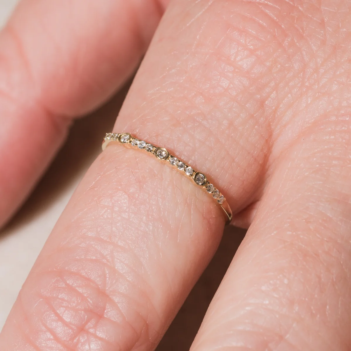 Solid Gold Delicate White Sapphire Stacking Band - Image 2