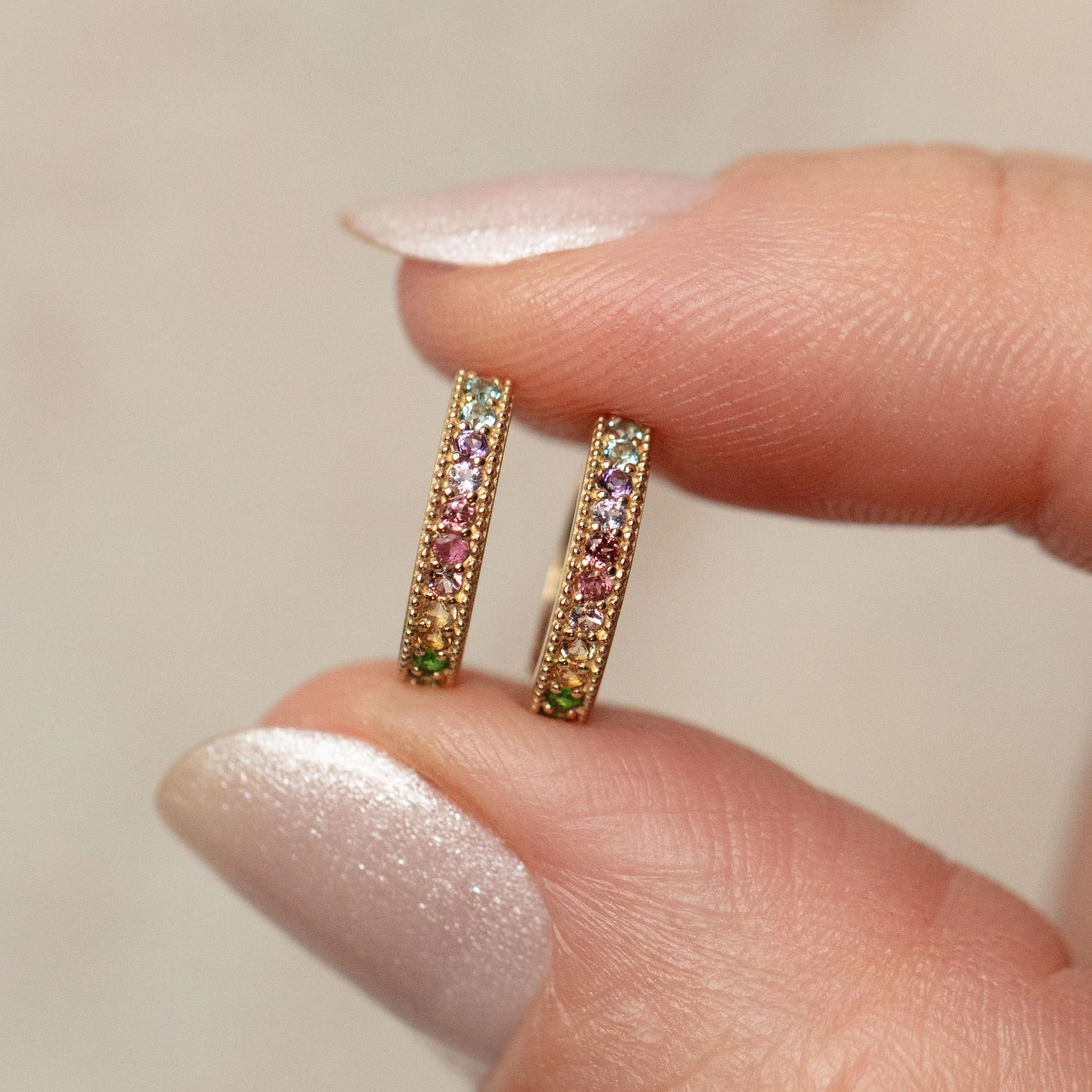 Solid Gold Live by the Sun Rainbow Huggie Hoops - Image 3