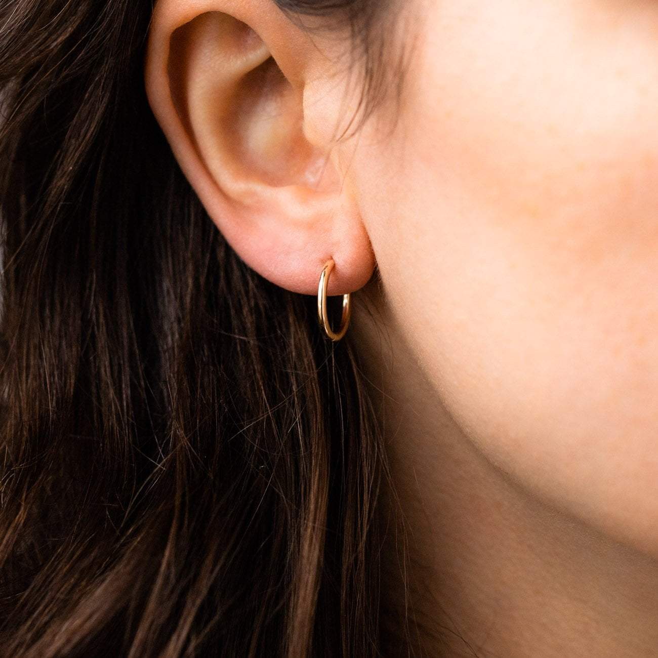 Solid Gold Simple Huggie Hoops - Image 3