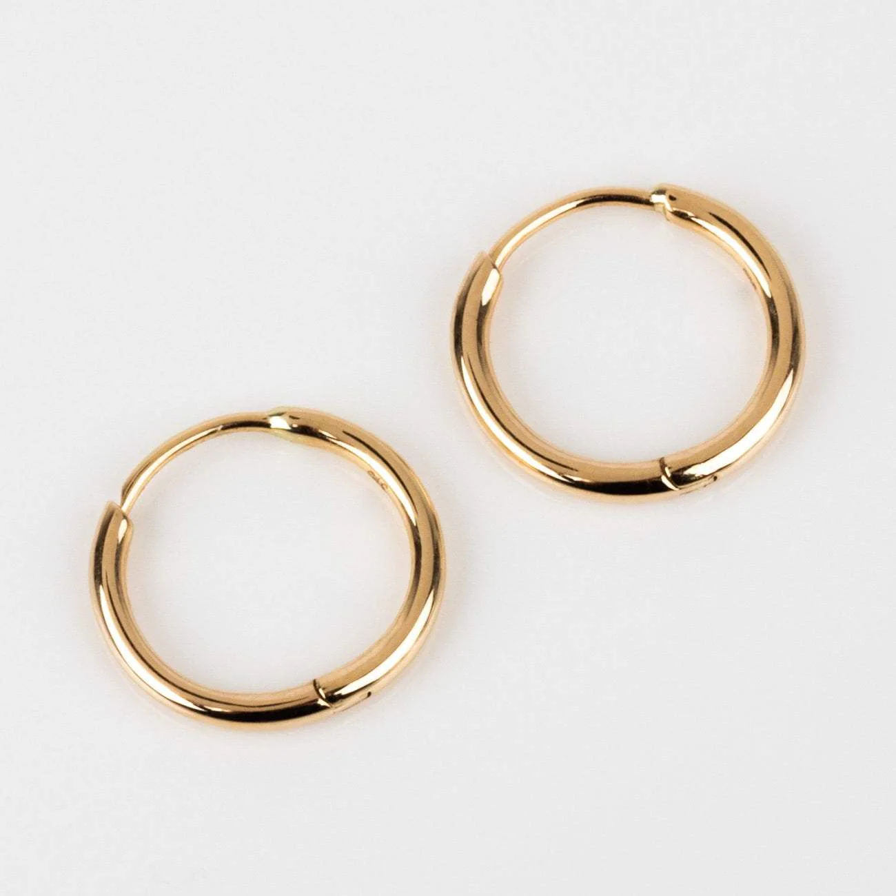 Solid Gold Simple Huggie Hoops - Image 6