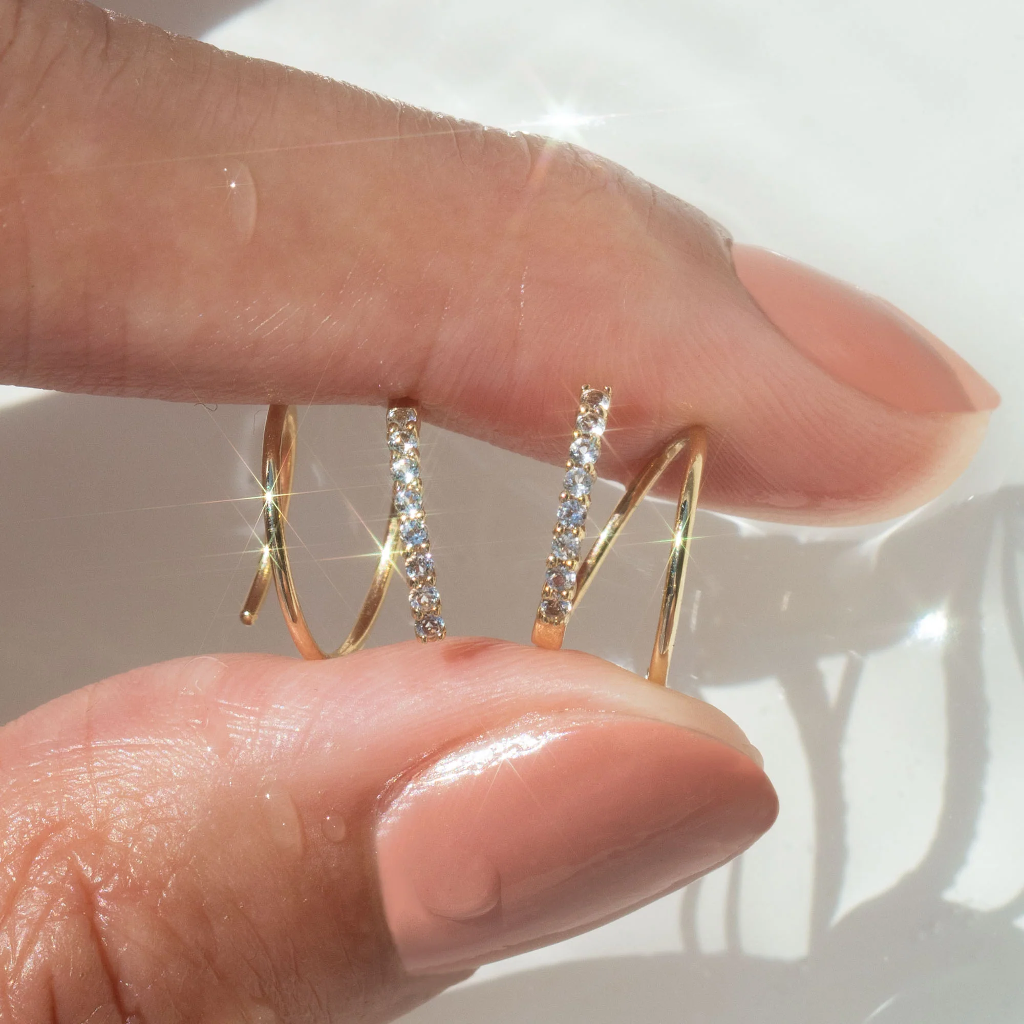 Solid Gold Twist Double Piercing Huggies - Image 2