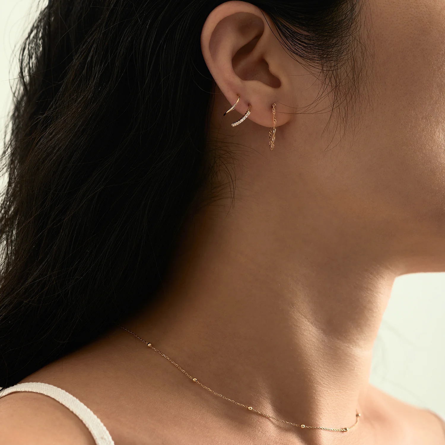 Solid Gold Twist Double Piercing Huggies - Image 3