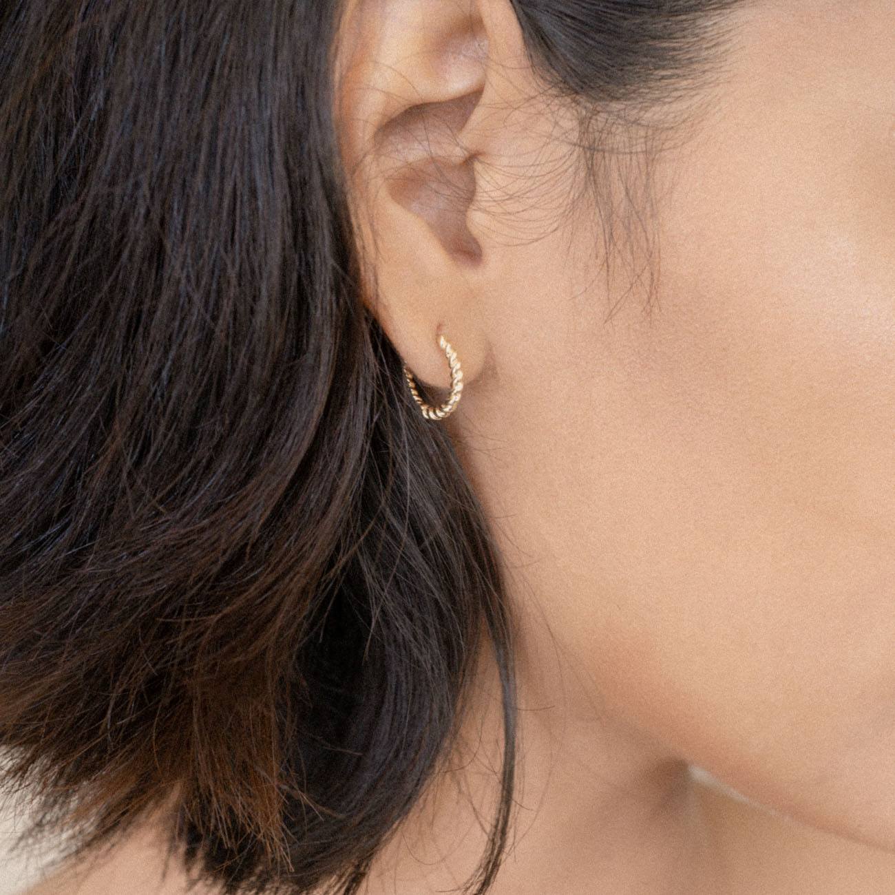 Solid Gold Twisted Huggie Hoops - Image 6